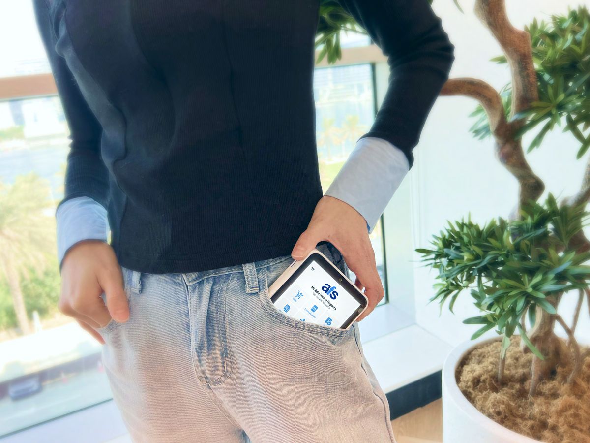 AFS Lite Mini POS being carried in a jeans pocket